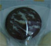 Pirulito de chocolate mesclado.